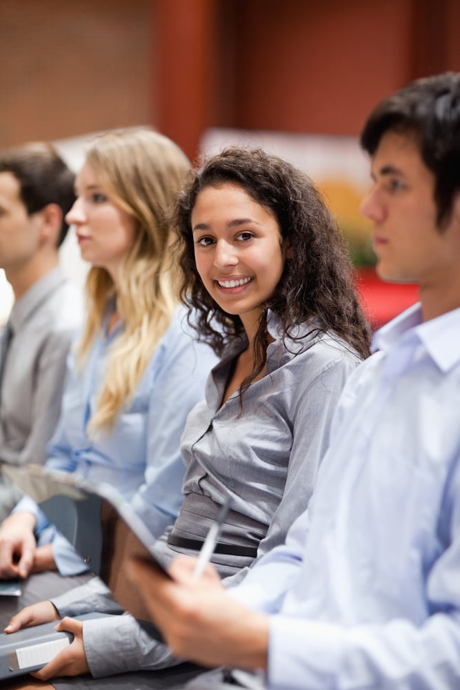 Young woman in symposium